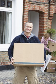 Man and van loading furniture in Brixton street