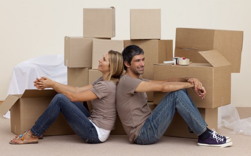 Brixton home removals team preparing furniture for transport and delivery