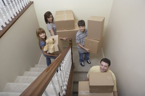 Packed office boxes and furniture ready for relocation